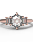 Close up of the Three Stone Alice Solitaire Engagement Ring in rose gold by Fluid Jewellery