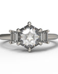 Close up of the Three Stone Alice Solitaire Engagement Ring in white gold by Fluid Jewellery