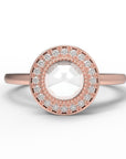 Close up of the Halo Aura Solitaire Engagement Ring in rose gold by Fluid Jewellery