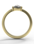 Close up of the Avery Solitaire Engagement Ring in yellow gold by Fluid Jewellery 3