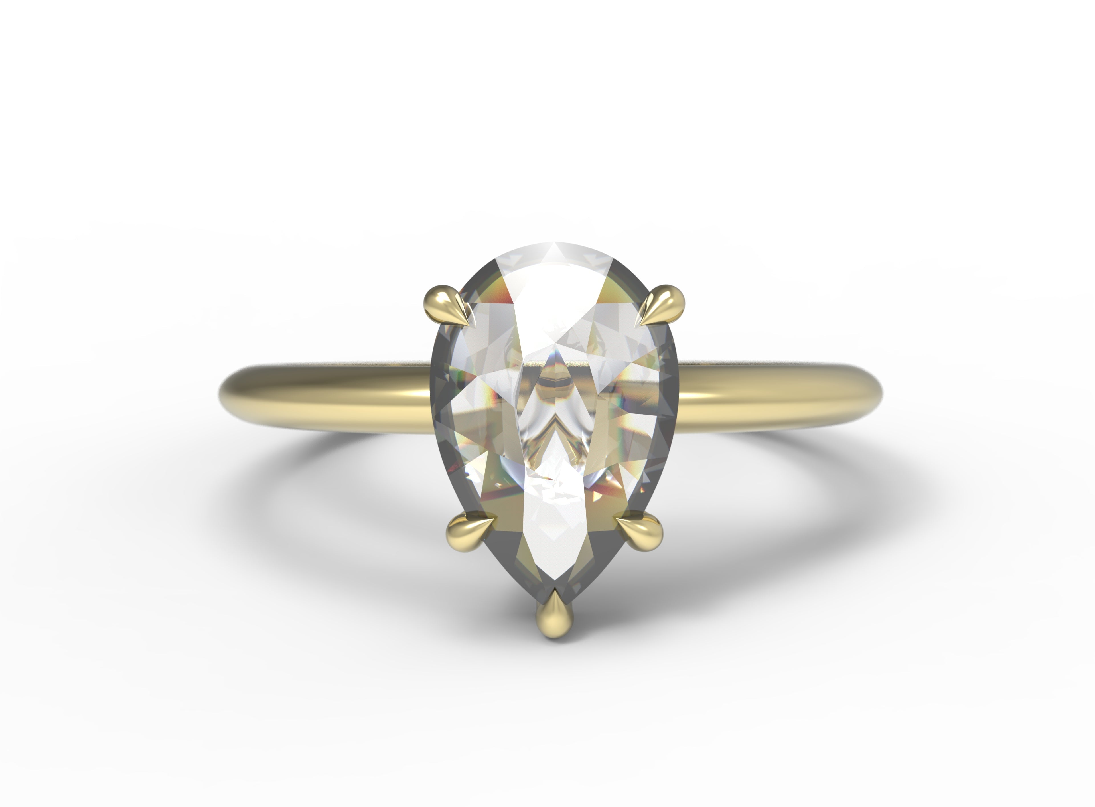 Close up of the Avery Solitaire Engagement Ring in yellow gold by Fluid Jewellery