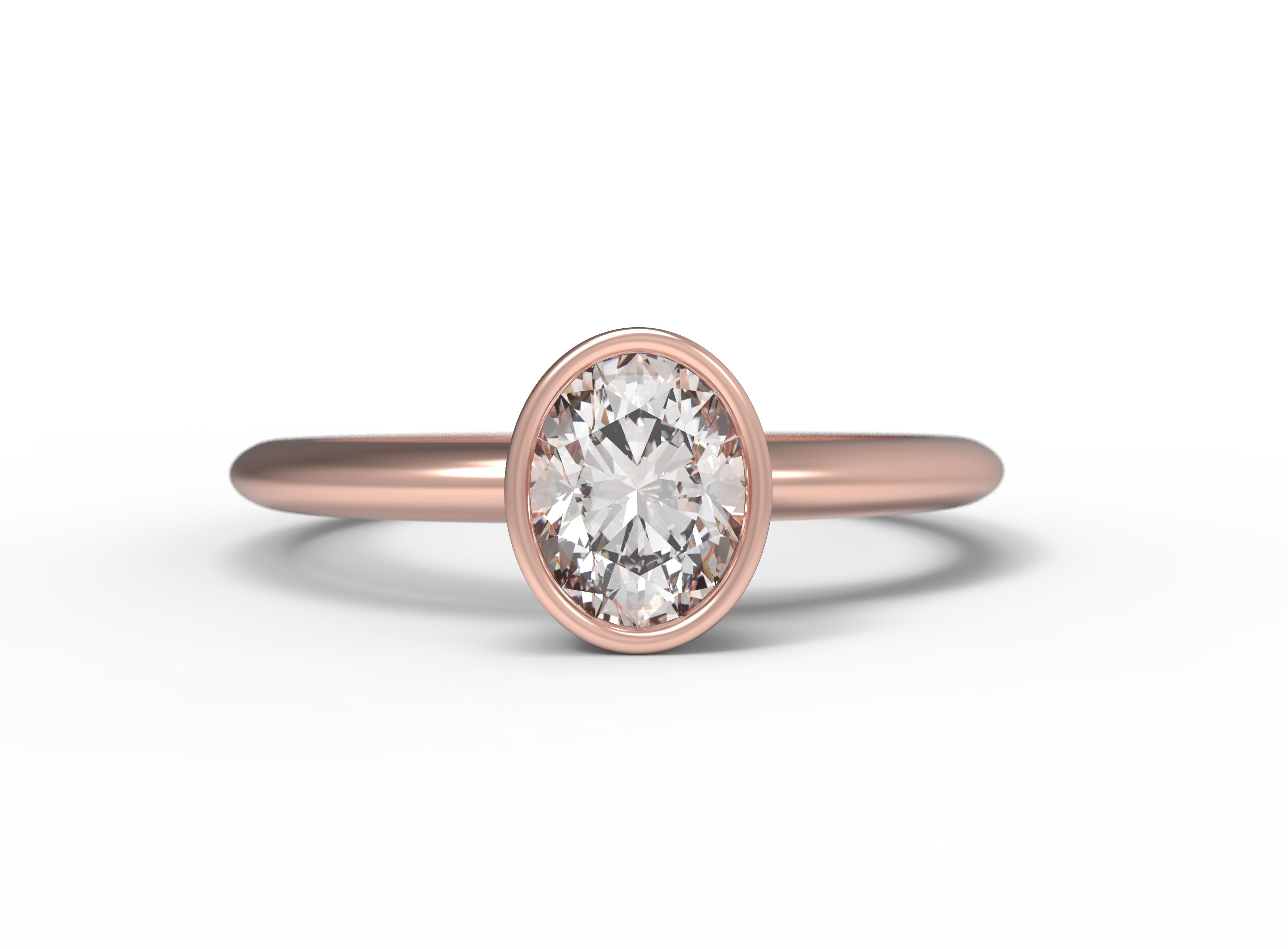 Close up of the Bezel Isla Solitaire Engagement Ring in rose gold by Fluid Jewellery