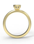 Close up of the Bezel Isla Solitaire Engagement Ring in yellow gold by Fluid Jewellery 3