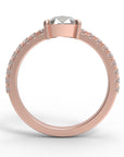 Close up of the Chloe Solitaire Engagement Ring in rose gold by Fluid Jewellery