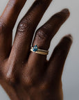 Model wearing the Accented Edith Solitaire Engagement Ring in gold by Fluid Jewellery 3
