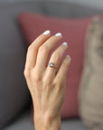 Model wearing the Three Stone Elizabeth Engagement Ring in yellow gold by Fluid Jewellery 3