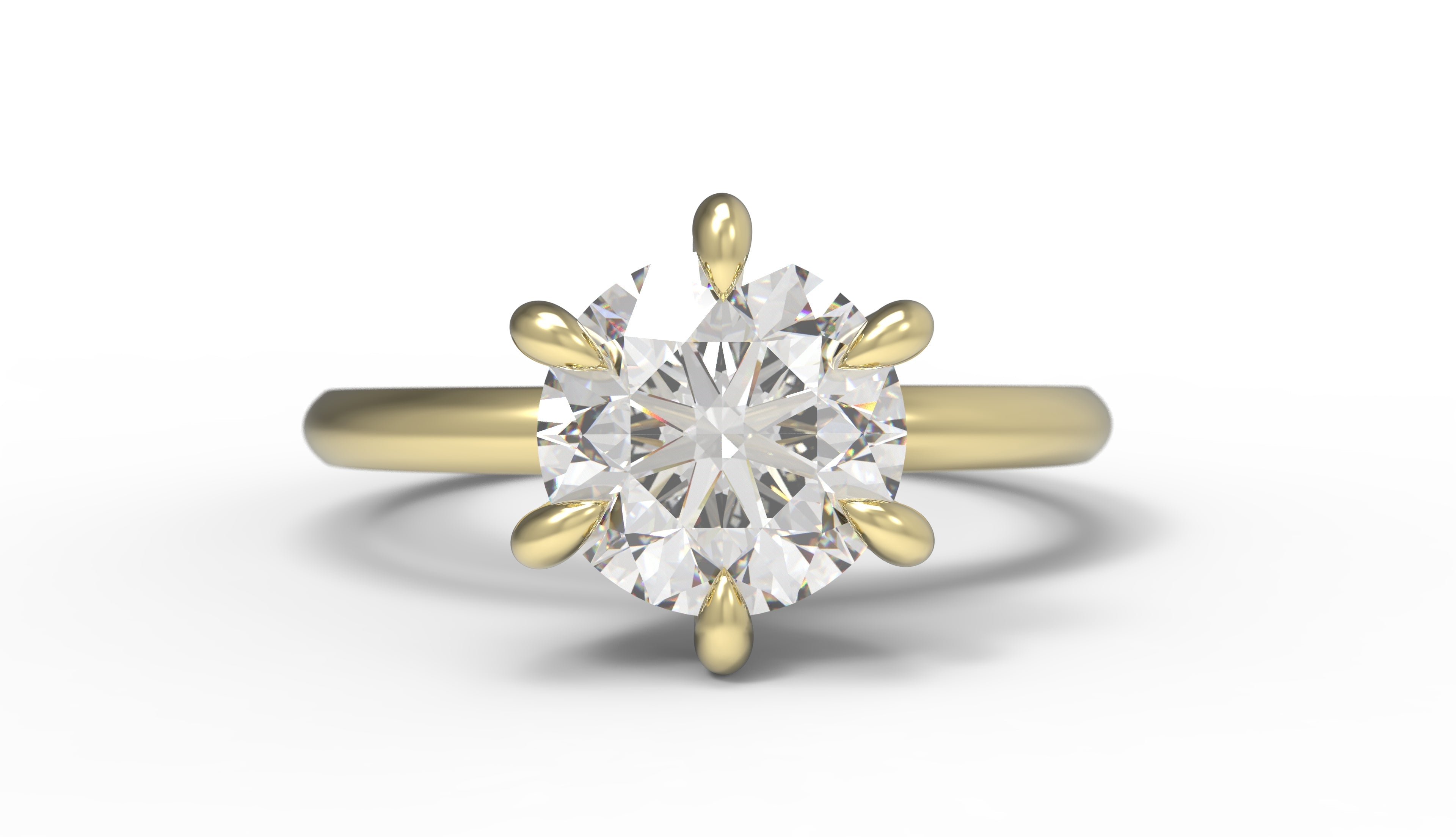 Close up of the Classic Esther Engagement Ring in yellow gold by Fluid Jewellery