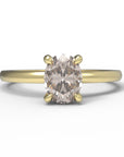 Close up of the Classic Kate Solitaire Engagement Ring in yellow gold by Fluid Jewellery