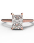 Close up of the Cathedral Sage Solitaire Engagement Ring in rose gold by Fluid Jewellery