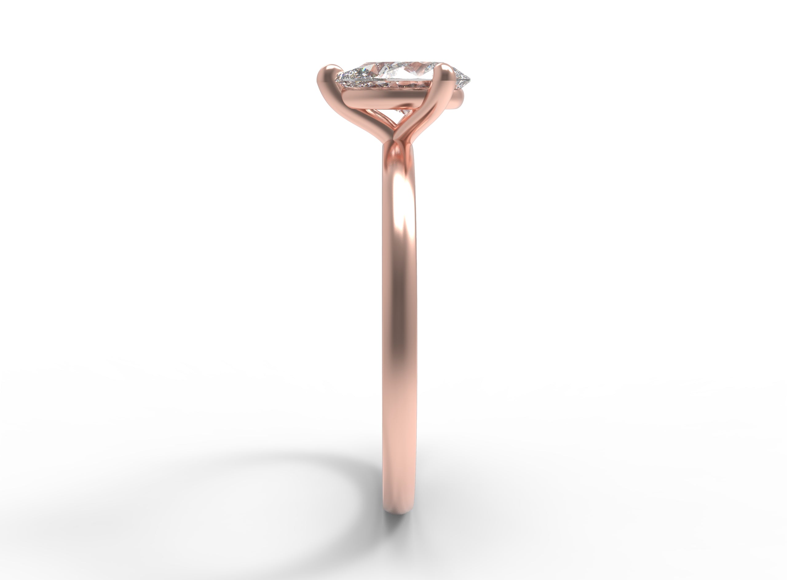 Close up of the Classic Sula Solitaire Engagement Ring in rose gold by Fluid Jewellery 2