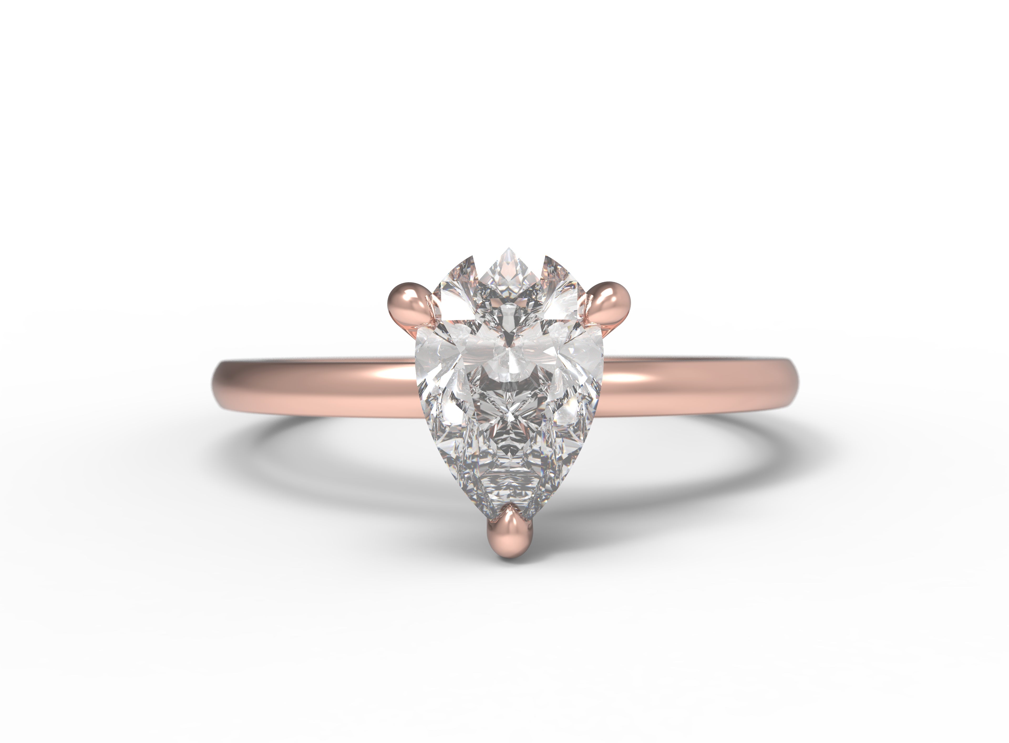 Close up of the Classic Sula Solitaire Engagement Ring in rose gold by Fluid Jewellery