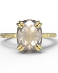 Close up view of the Classic Talon Solitaire Engagement Ring in yellow gold