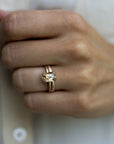 Model wearing the Classic Talon Solitaire Engagement Ring in gold