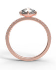 Close up of the Accented Zoe Solitaire Engagement Ring in rose gold by Fluid Jewellery 3