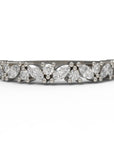 Close up of the cluster Marissa womens wedding band by Fluid Jewellery in white gold