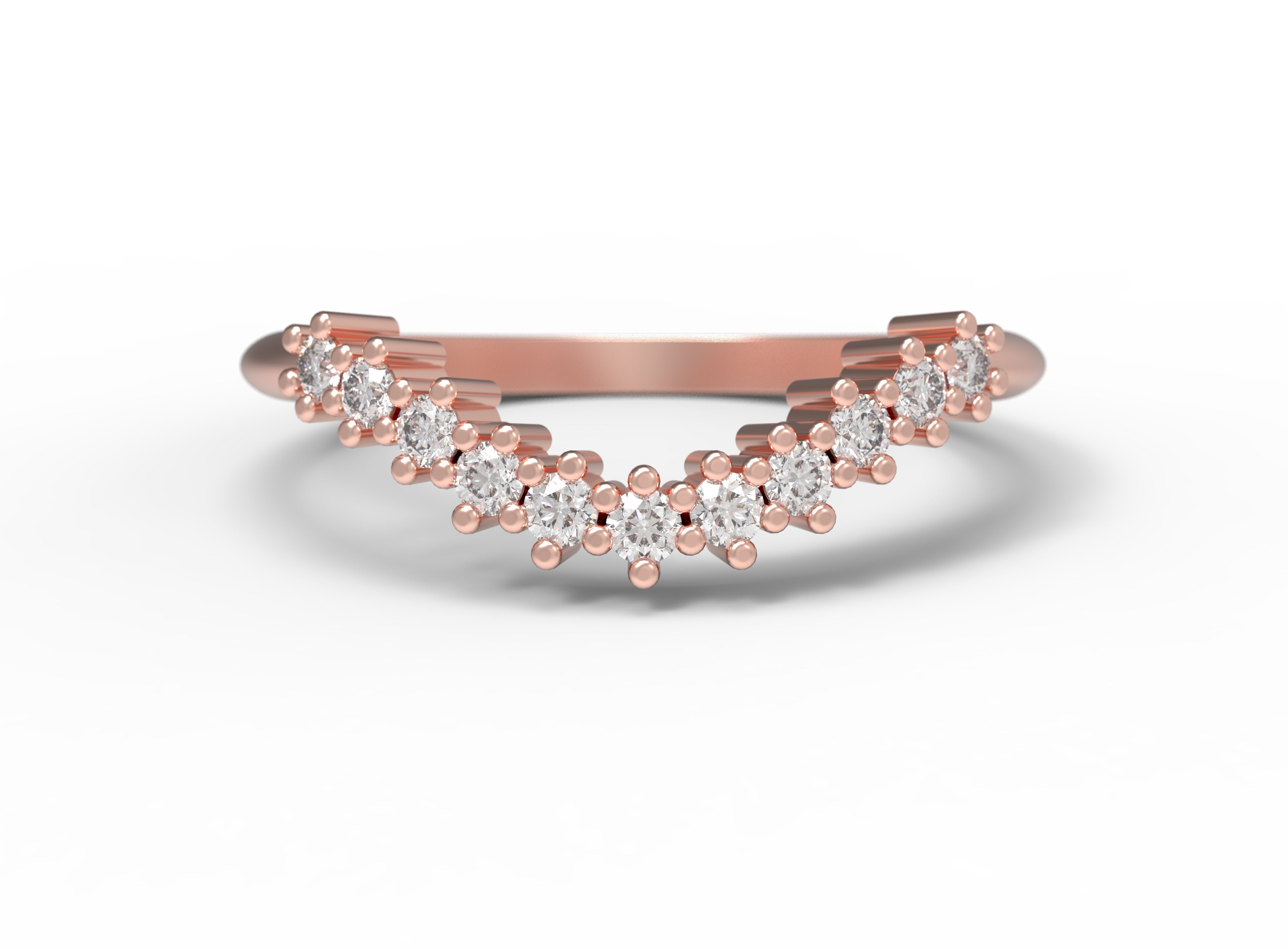 Close up of the curved Ida womens wedding band by Fluid Jewellery in rose gold