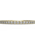 Close up of the classic Eternity womens wedding band by Fluid Jewellery in yellow gold