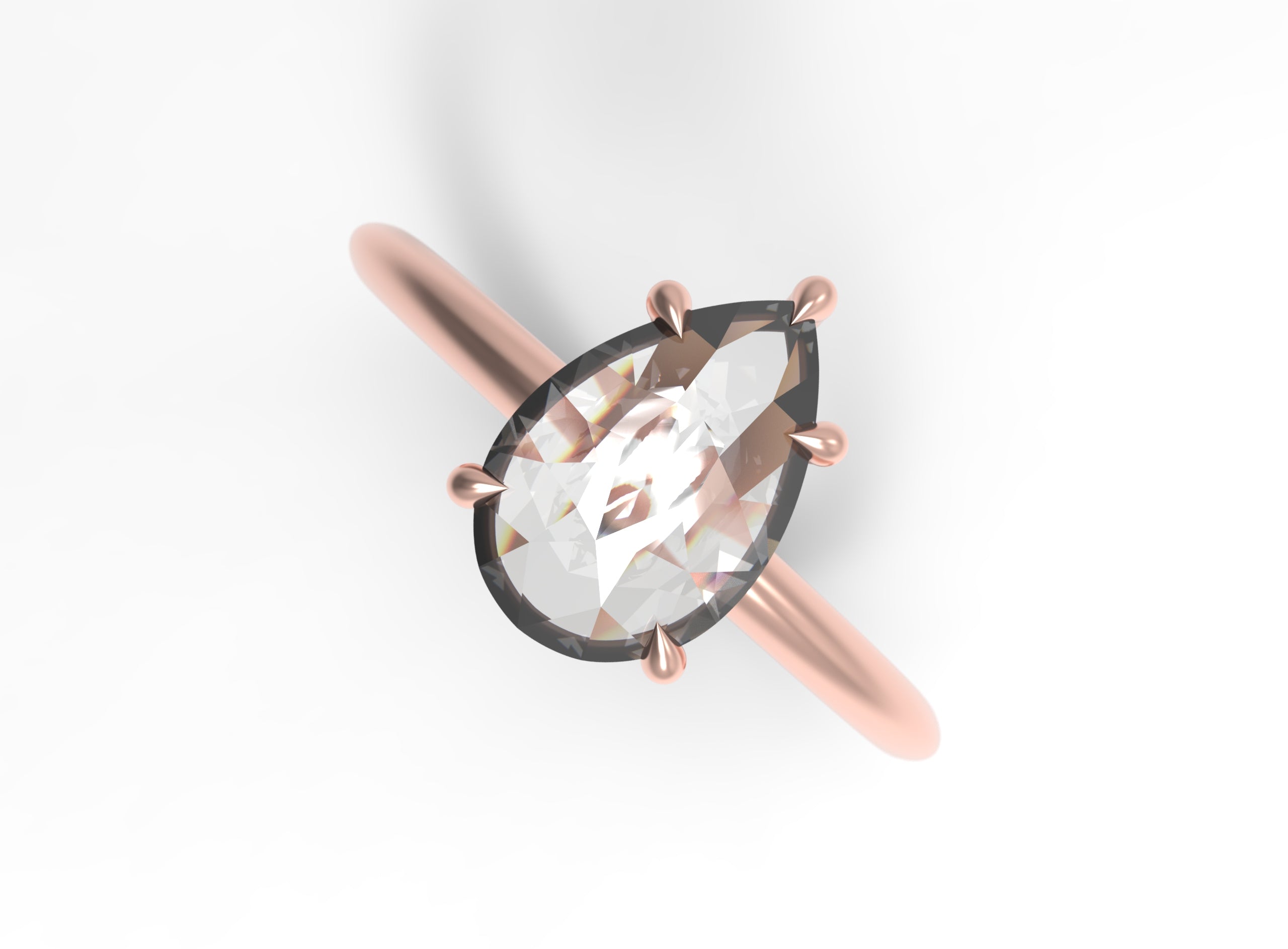 Close up of the Avery Solitaire Engagement Ring in rose gold by Fluid Jewellery