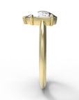 Close up of the Avery Solitaire Engagement Ring in yellow gold by Fluid Jewellery 2