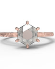 Close up of the Classic Celeste Solitaire Engagement Ring in rose gold by Fluid Jewellery