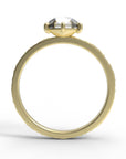 Close up of the Classic Celeste Solitaire Engagement Ring in yellow gold by Fluid Jewellery 3