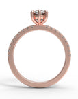 Close up of the Accented Edith Solitaire Engagement Ring in rose gold by Fluid Jewellery  2