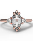 Close up of the Three Stone Elizabeth Engagement Ring in rose gold by Fluid Jewellery