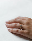 Model wearing the Classic Esther Engagement Ring in yellow gold by Fluid Jewellery 3
