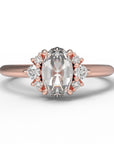 Close up of the Cluster Matilda Solitaire Engagement Ring in rose gold by Fluid Jewellery