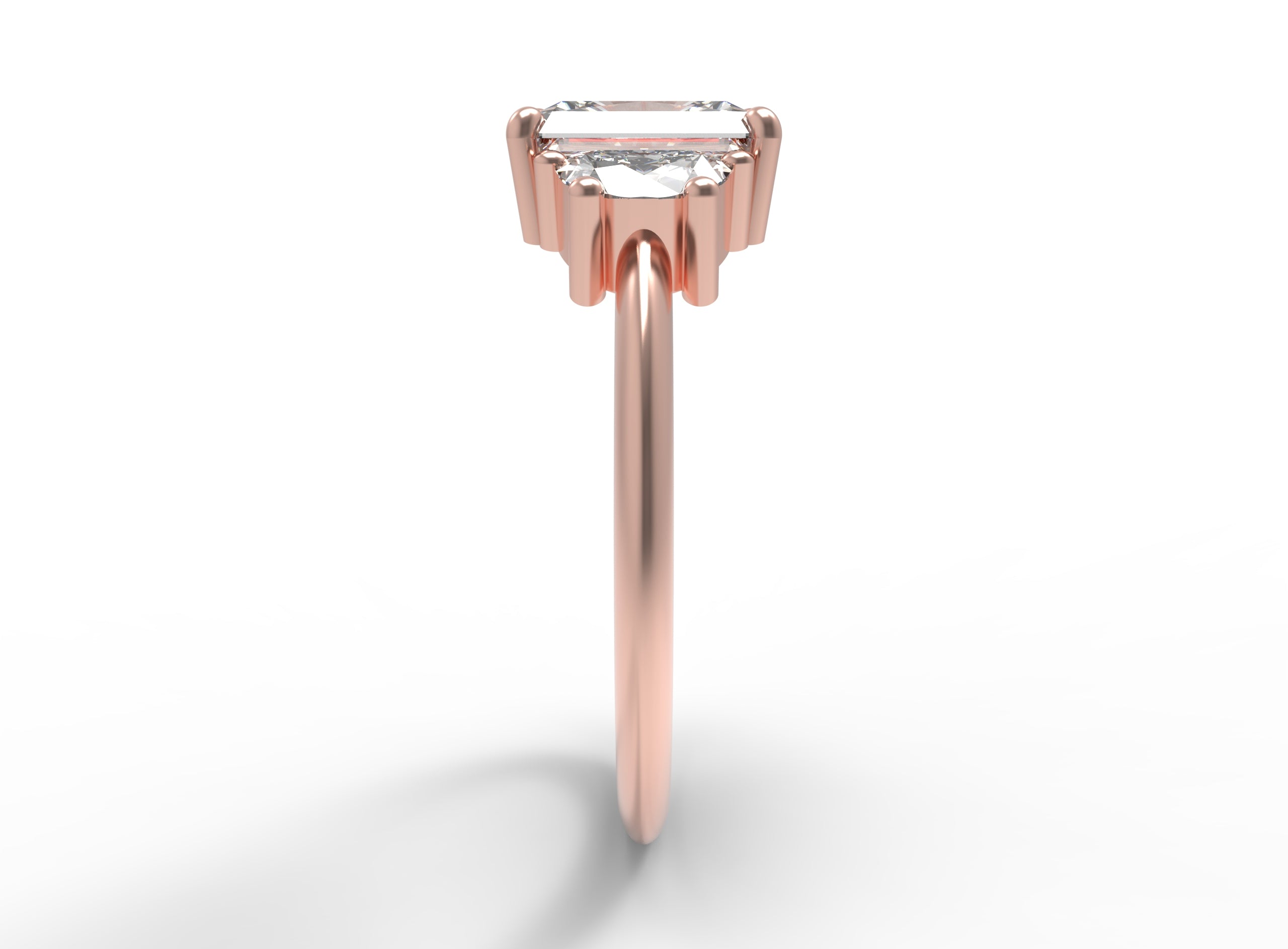 Close up of the Three Stone Merike Engagement Ring in rose gold by Fluid Jewellery