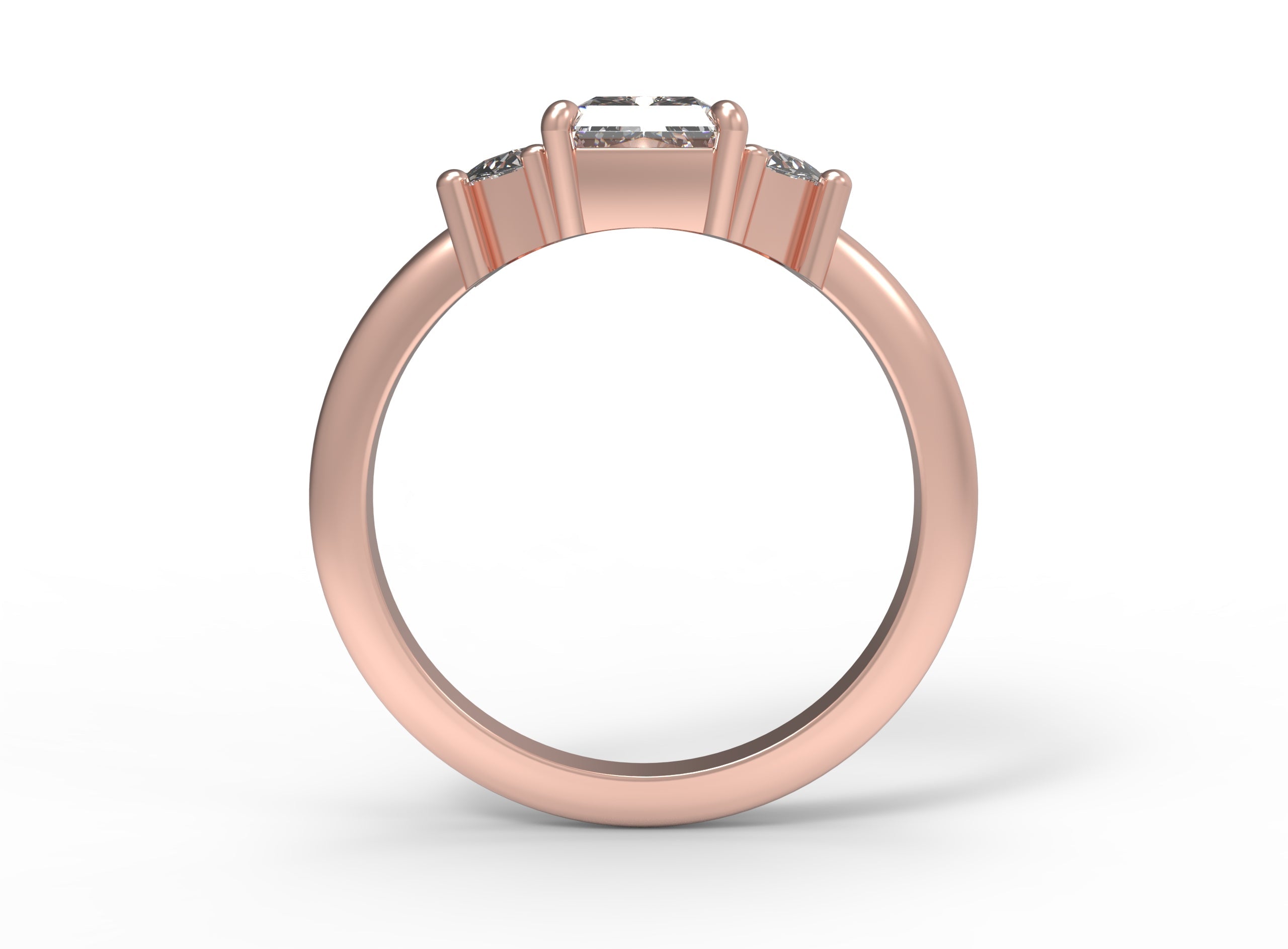 Close up of the Three Stone Merike Engagement Ring in rose gold by Fluid Jewellery 2