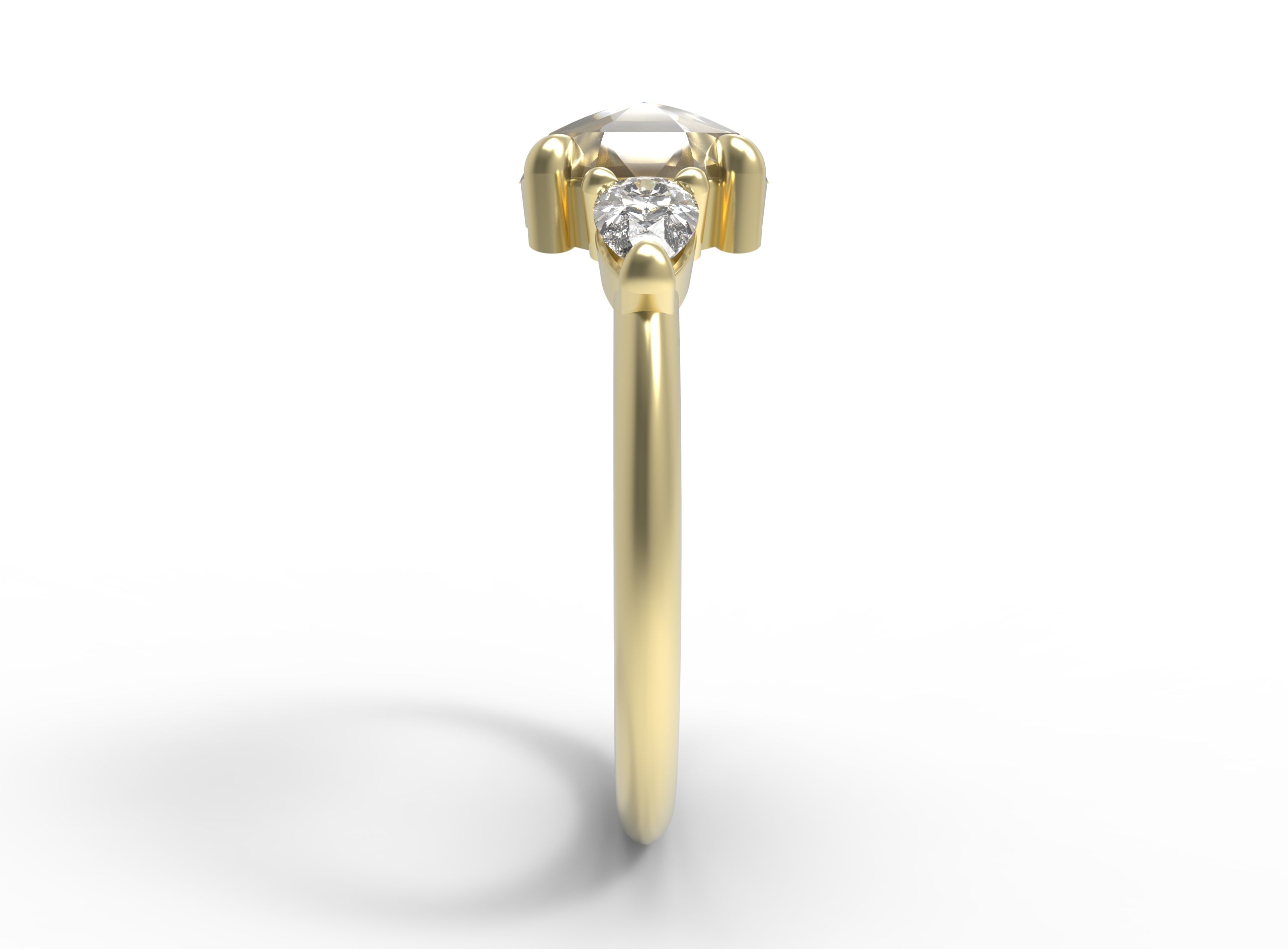 Close up of the Three Stone Sadie Engagement Ring in yellow gold by Fluid Jewellery 2