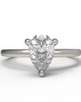Close up of the Classic Sula Solitaire Engagement Ring in white gold by Fluid Jewellery