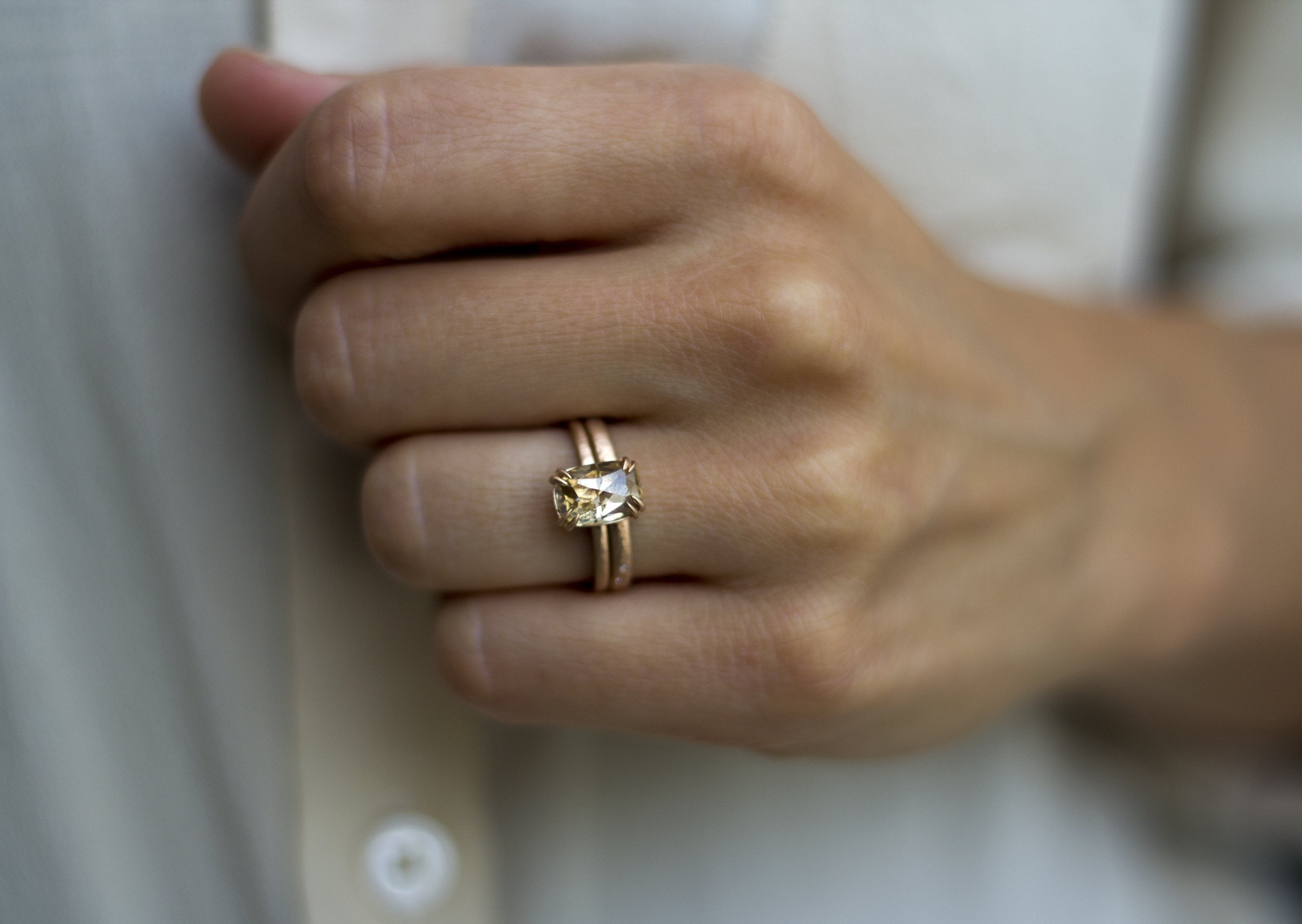 Model wearing the  Classic Talon Solitaire Engagement Ring in gold