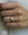 Model wearing the  Classic Talon Solitaire Engagement Ring in gold