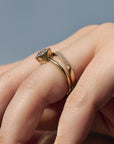 Close-up side profile of the Flora Old European cut diamond solitaire paired with a milgrain diamond wedding band, showing the floral engravings.