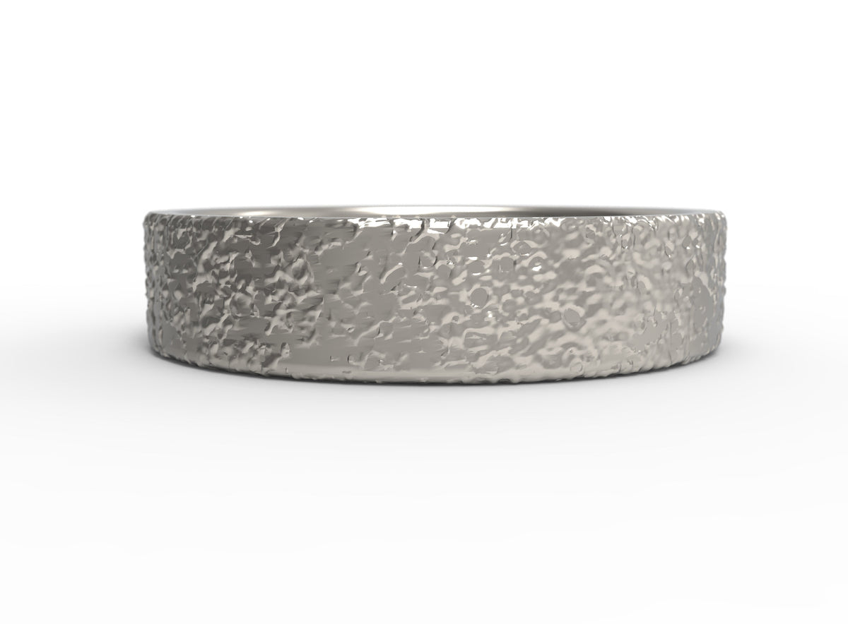 Close up of the mens Arena wedding band in white gold