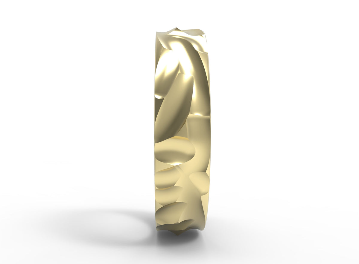 Close up of the mens Wave wedding band in yellow gold 2