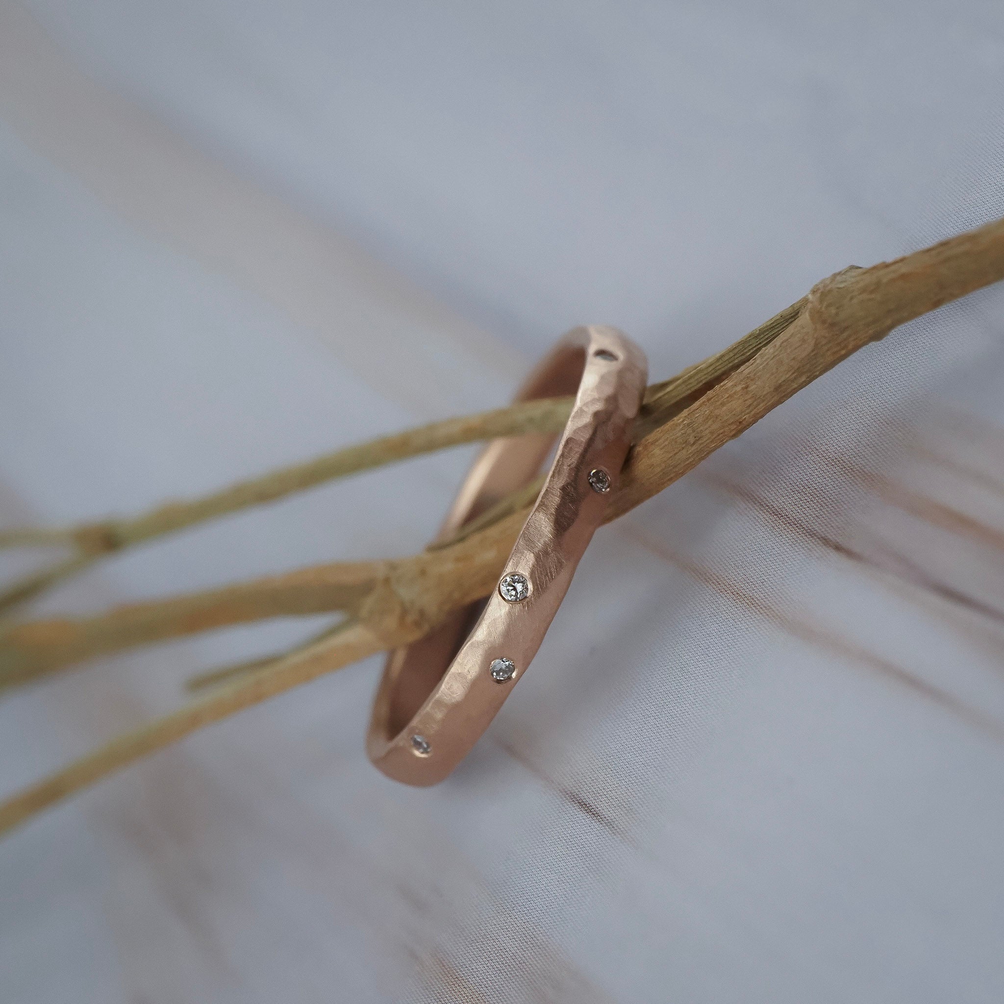 Starlight Fairmined gold wedding band featuring a hammered texture finish and Canadian diamonds.