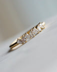 Close up of thecluster Maeve womens wedding band by Fluid Jewellery in yellow gold 4