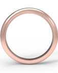 Close up of the curved flow womens wedding band by Fluid Jewellery in rose gold 3