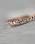 Close up of the classic Eternity womens wedding band by Fluid Jewellery in yellow gold 4