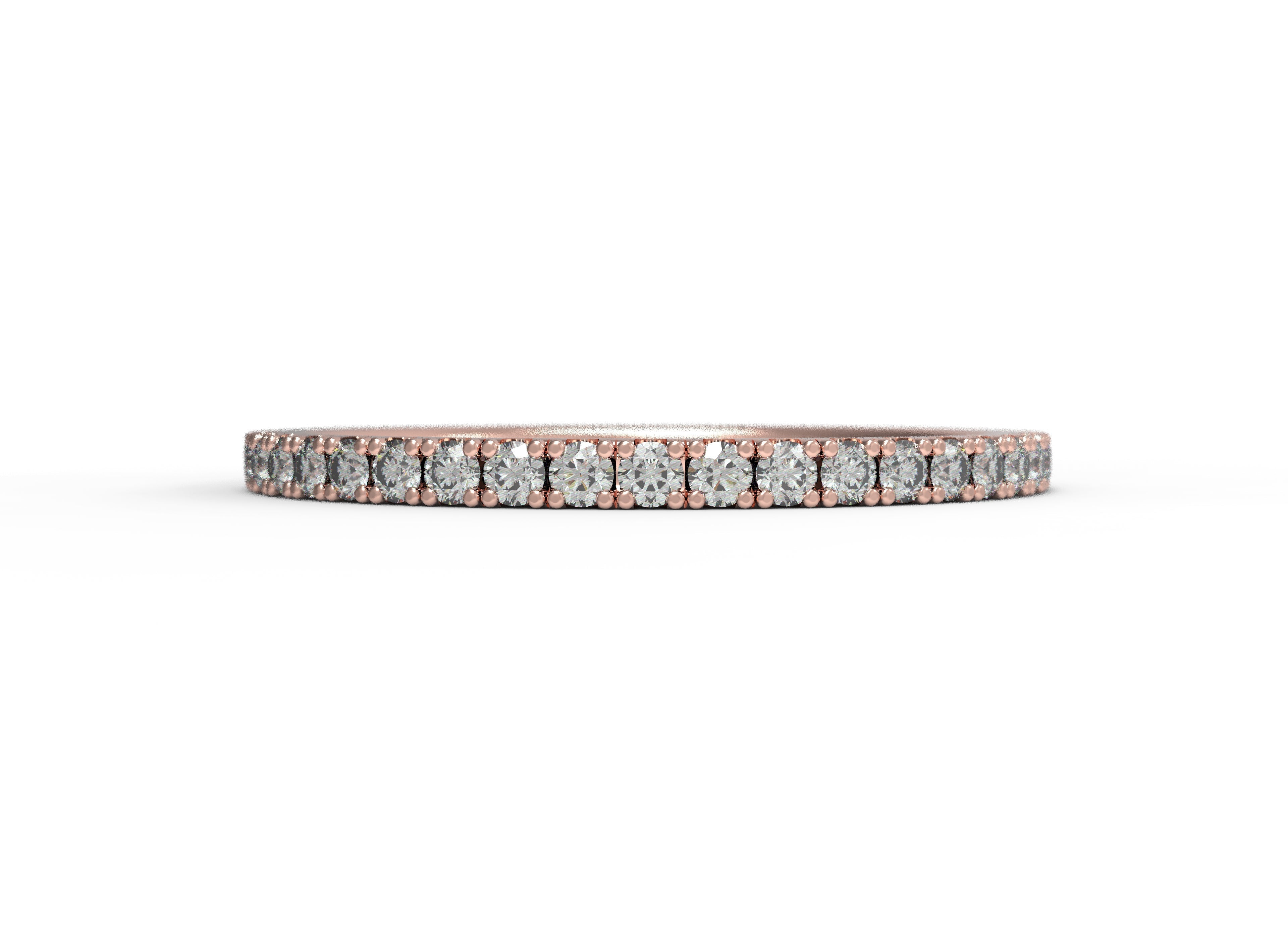 Close up of the classic Eternity womens wedding band by Fluid Jewellery in rose gold