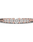 Close up of the seven stone Elsie womens wedding band by Fluid Jewellery in rose gold
