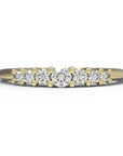 Close up of the seven stone Elsie womens wedding band by Fluid Jewellery in yellow gold